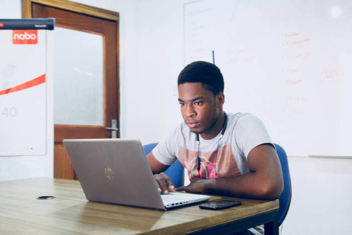 Man revising on laptop